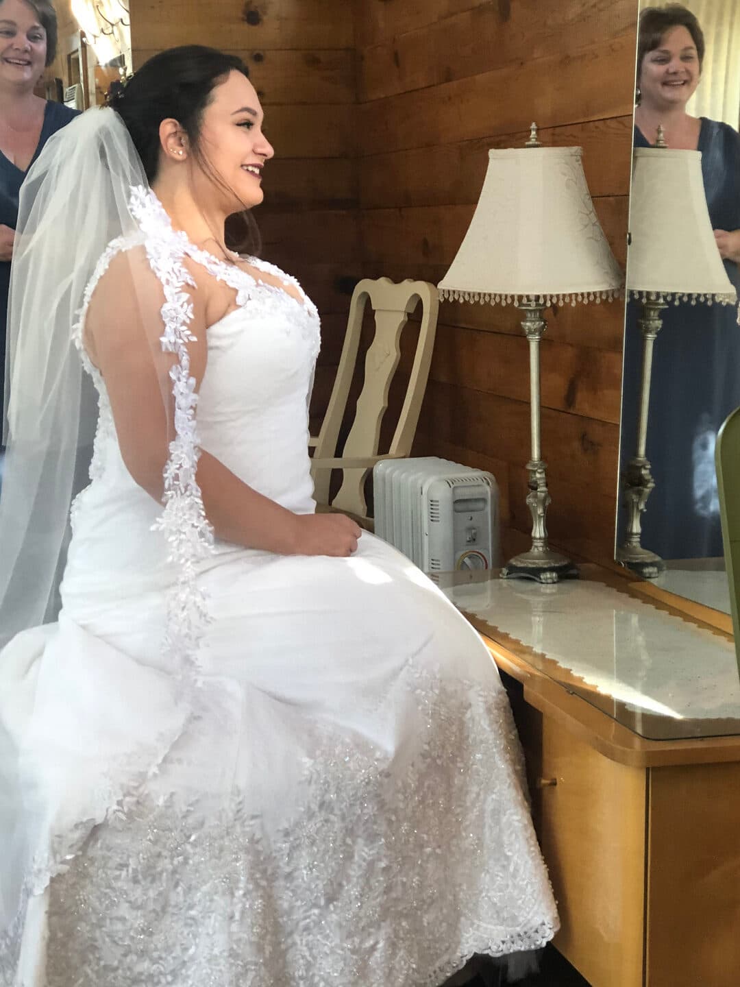 Gabby in her custom gown and veil in the Colorado mountains